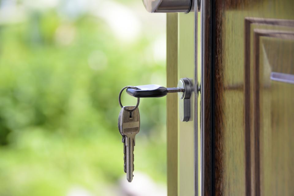 House key turning in a front door lock
