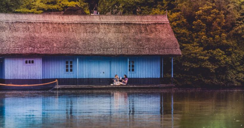 Small standalone cottage beside the water
