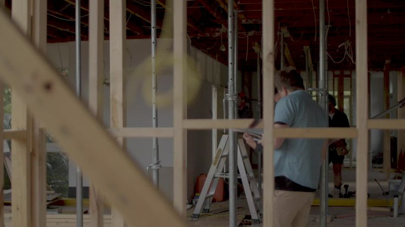 Open timber framing inside an unfinished space